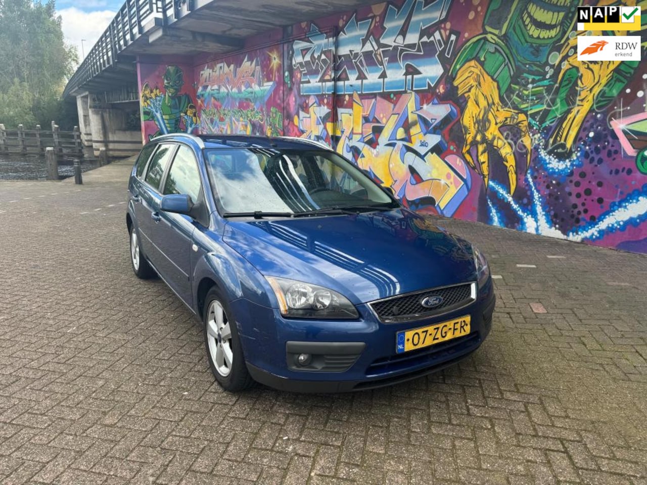 Ford Focus Wagon - 1.8-16V Ambiente Flexifuel airco navigatie sport velgen leuke auto - AutoWereld.nl