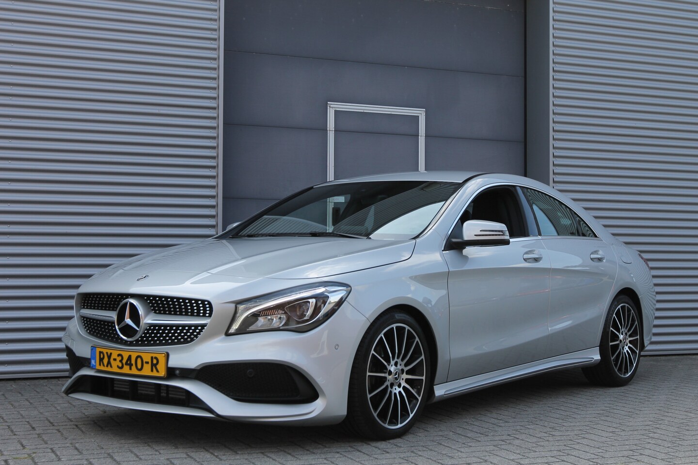 Mercedes-Benz CLA-Klasse - 180 Automaat I AMG I White Art I Navi I Camera I 33000 km - AutoWereld.nl