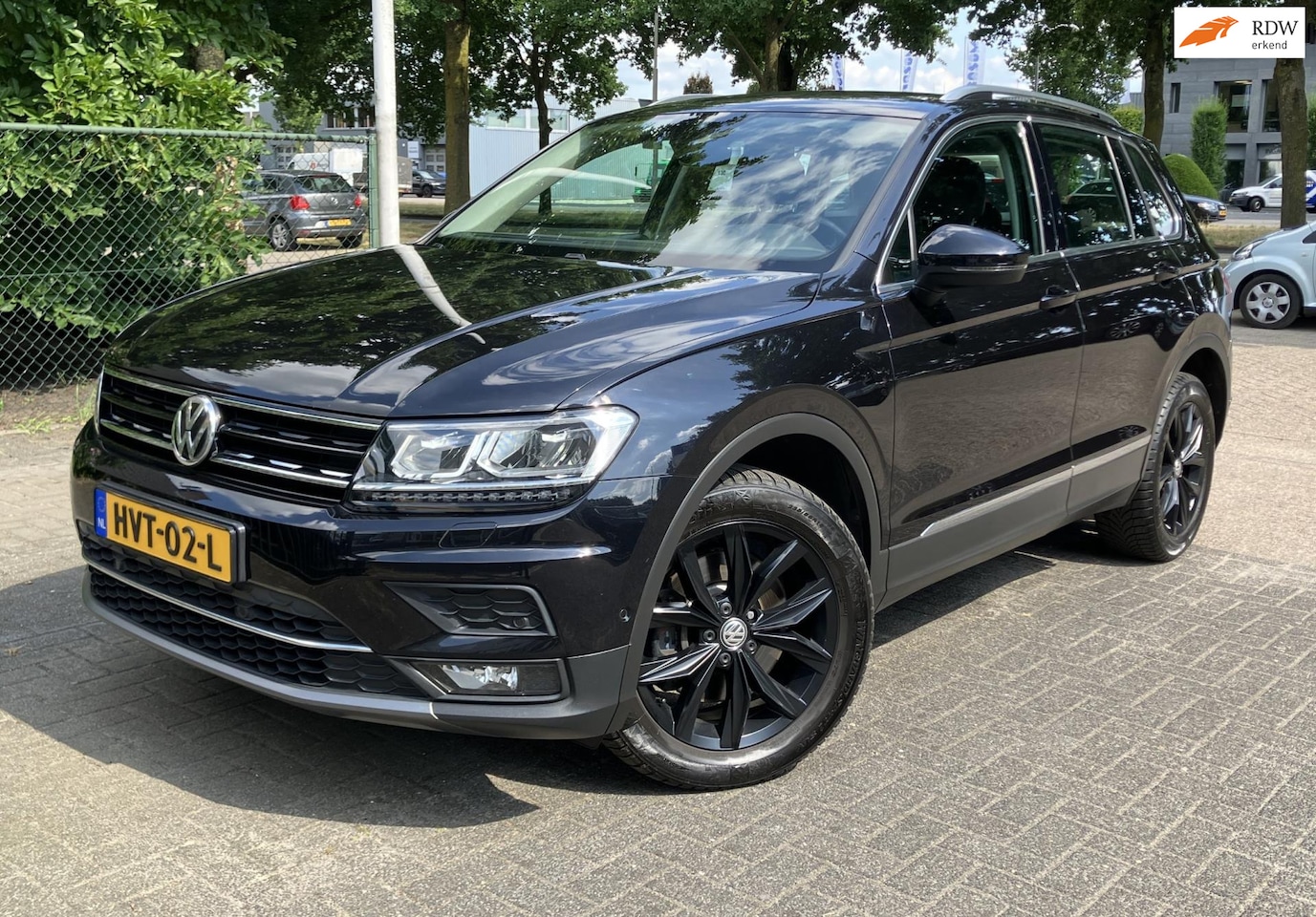 Volkswagen Tiguan - 2.0 TSI 4Motion Highline Navi Camera L.m Trekhaak - AutoWereld.nl