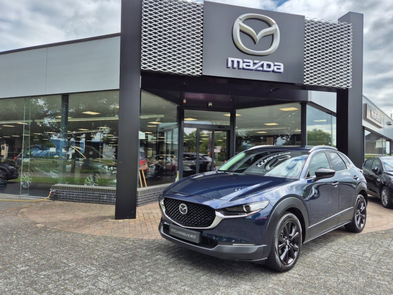 Mazda CX-30 - E- SKYACTIV- G 2.0 150 6AT M-HYBRID HOMURA - AutoWereld.nl