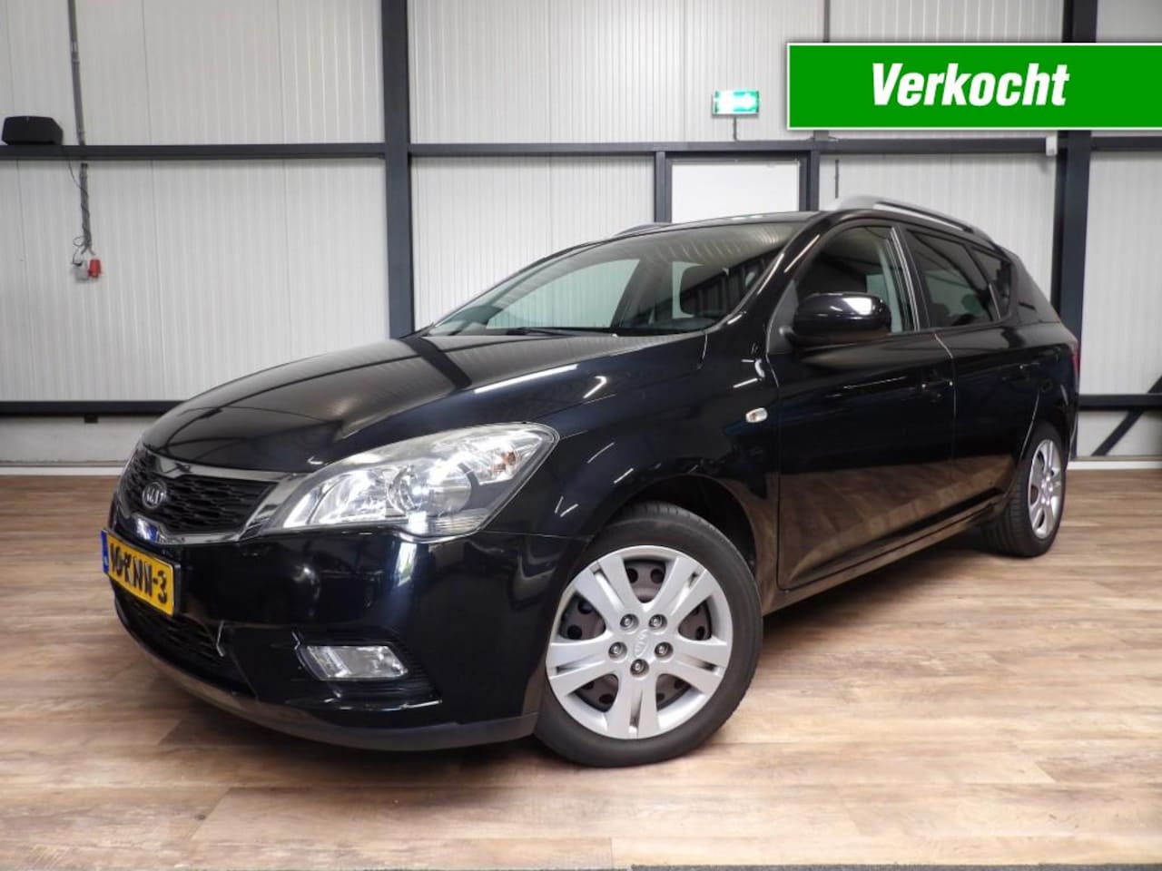 Kia Cee'd Sporty Wagon - 1.4 sporty wagon - navigatie - airco - nette staat! - AutoWereld.nl