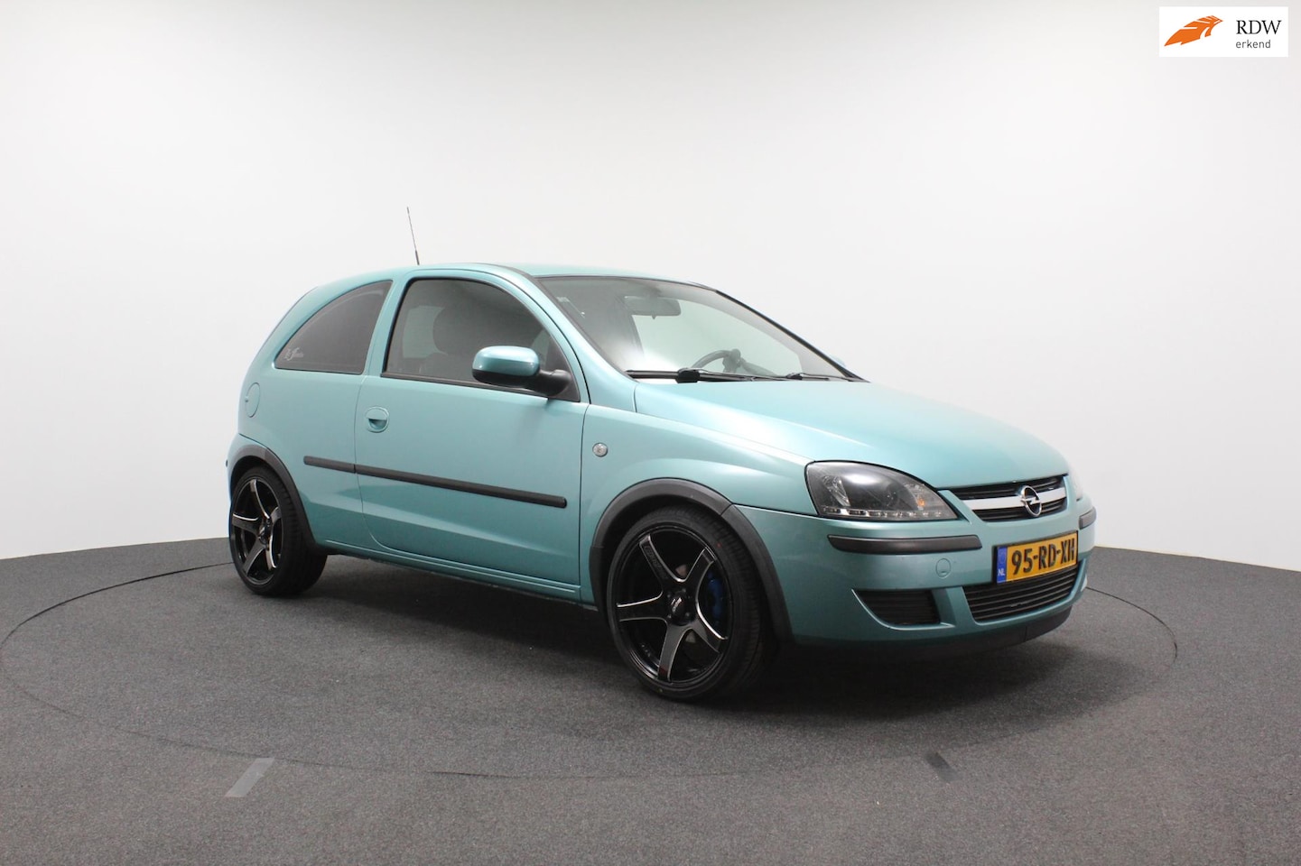 Opel Corsa - 1.2-16V Full Rhythm | Airco | Automaat | Handgas + rem | Invalide auto maar toch sportief - AutoWereld.nl