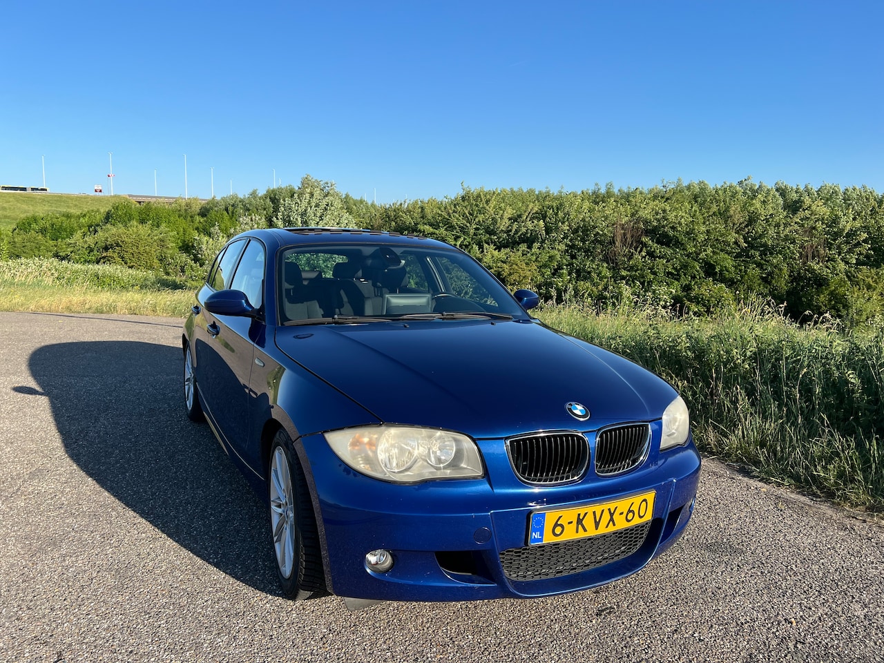 BMW 1-serie - 118i High Executive M-sport / Schuifdak / Carplay - AutoWereld.nl