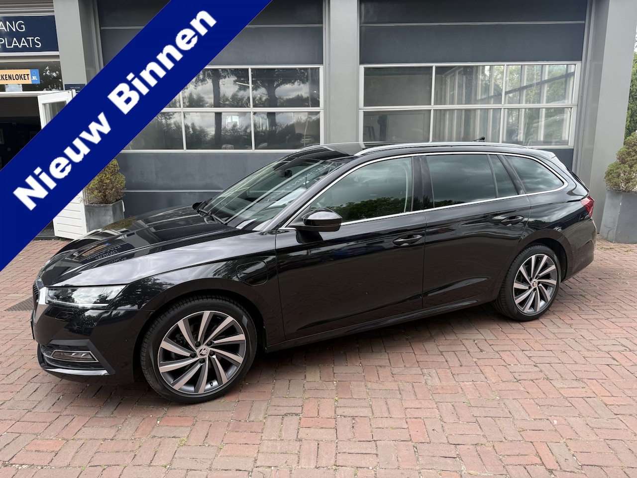 Skoda Octavia Combi - 1.4 TSI iV PHEV Sportline Business 07-2021 72.389 KM - AutoWereld.nl