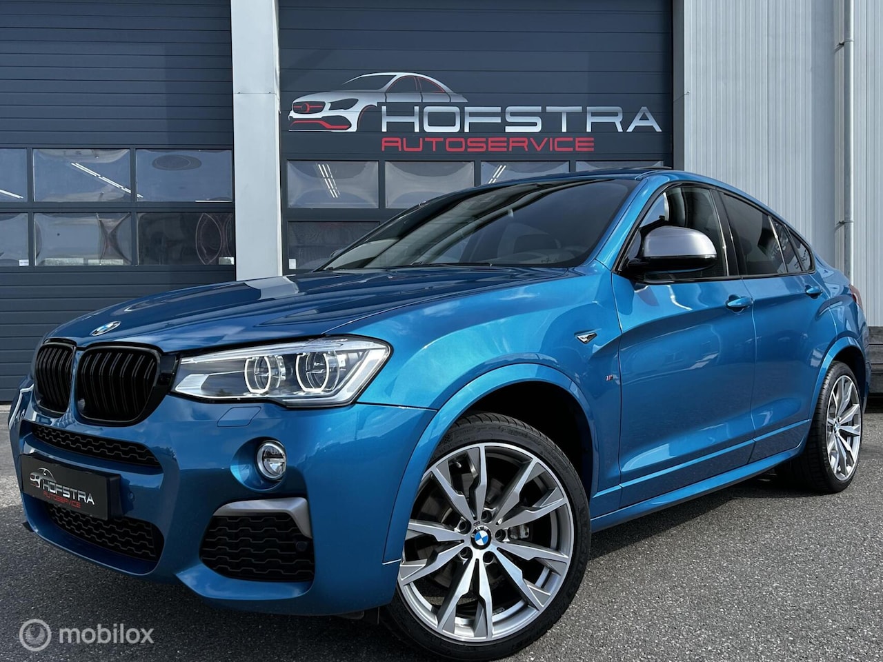 BMW X4 - M40i High Executive Pano H&K Trekhk Camera Head-Up Dab - AutoWereld.nl