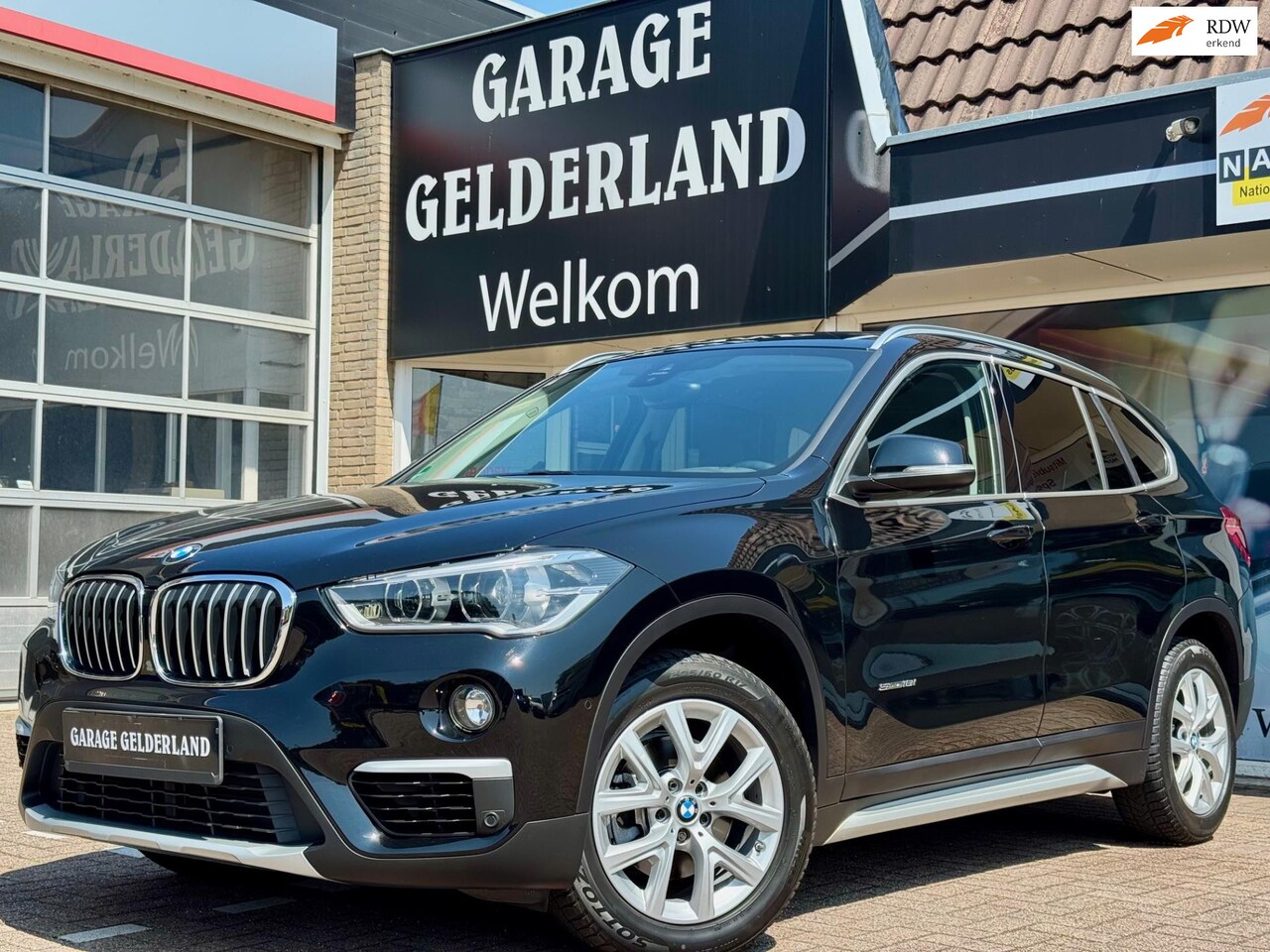 BMW X1 - SDrive18i High Executive | Volleder | Navi | Cruise | Climate | Isofix | Pdc | Full-option - AutoWereld.nl