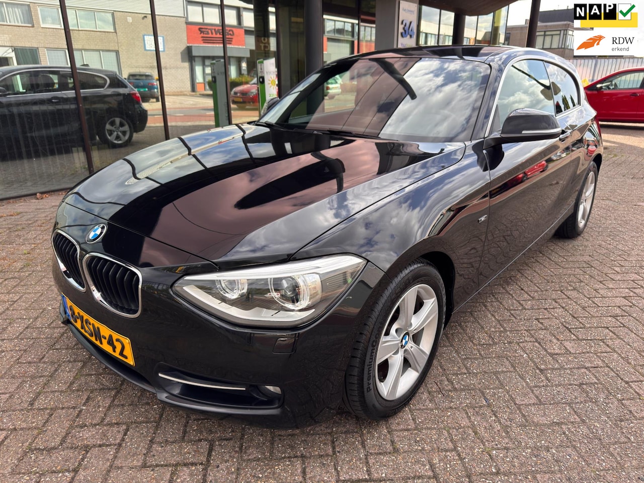 BMW 1-serie - 116i High Executive / Navi / PDC / Leder / LED - AutoWereld.nl