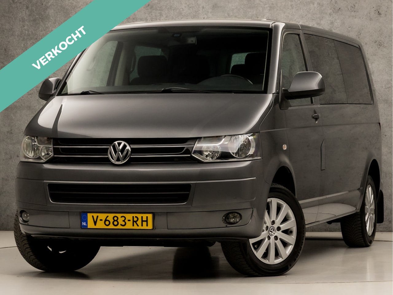Volkswagen Transporter Caravelle - 2.0 TDI L2H1 (ELEKTRISCHE SCHUIFDEUREN, NAVIGATIE, STOELVERWARMING, GETINT GLAS, BLUETOOTH - AutoWereld.nl