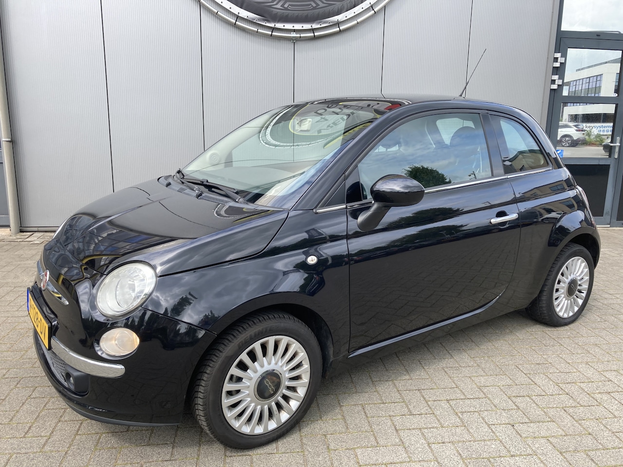 Fiat 500 - 1.2 Lounge Panorama | Blue and Me | Airco - AutoWereld.nl