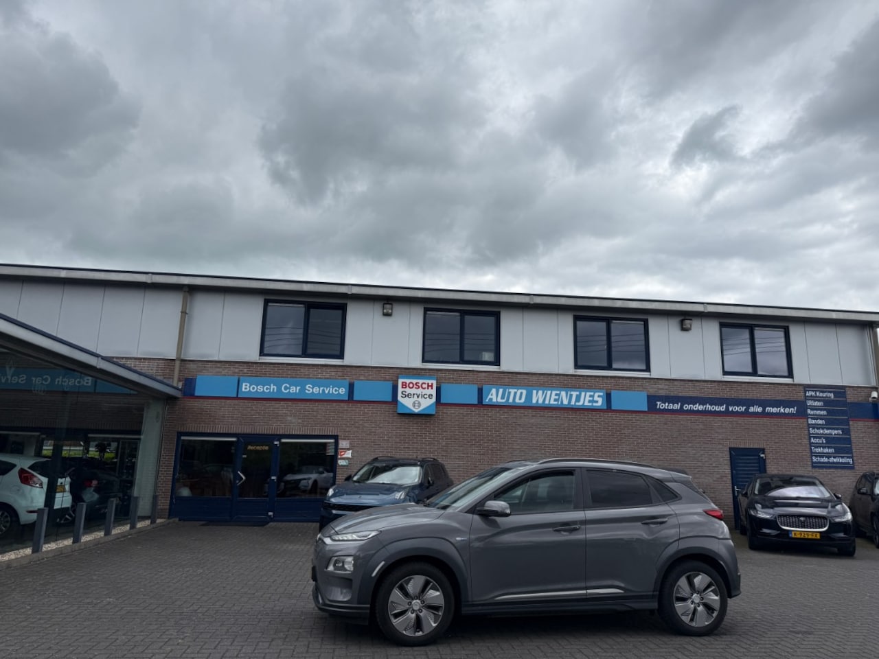 Hyundai Kona Electric - EV Premium Sky 64kWh | Leer | Navi - AutoWereld.nl
