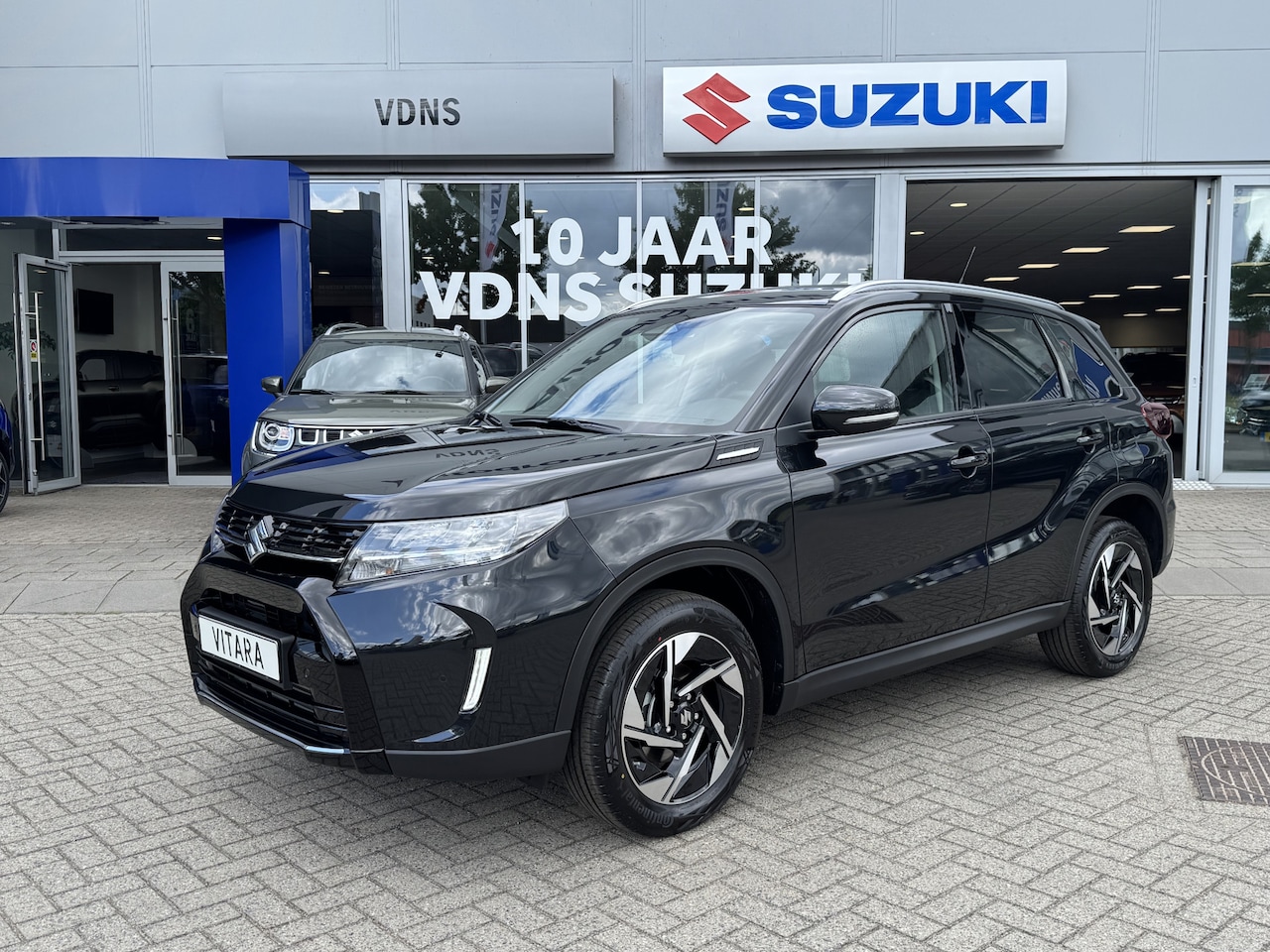 Suzuki Vitara - 1.4 Boosterjet Style Smart Hybrid Direct uit voorraad leverbaar. Nu met €1.000 extra voord - AutoWereld.nl