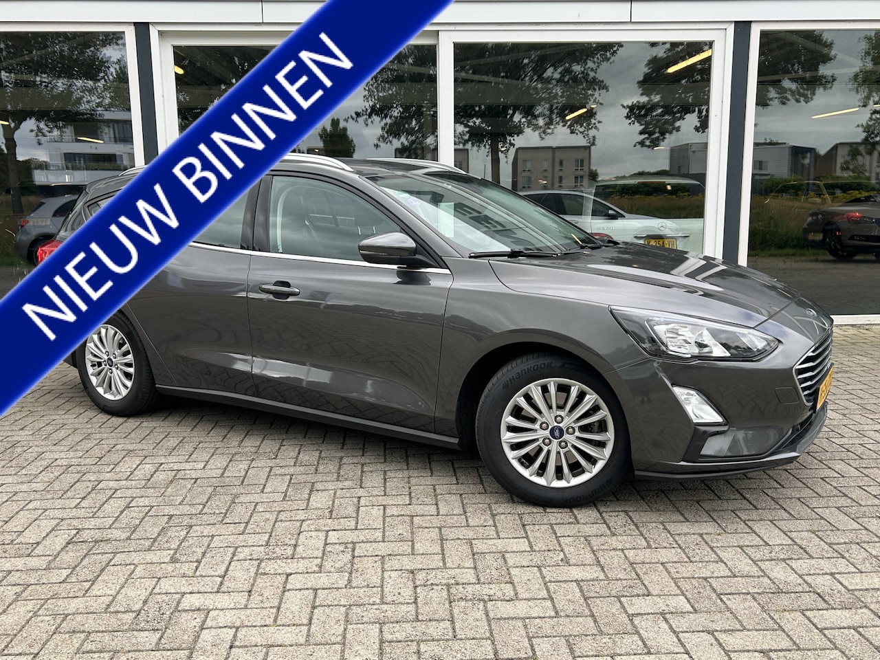 Ford Focus Wagon - 1.0 EcoBoost Titanium Business 50% deal 6.475,- ACTIE Trekhaak / Carplay / Clima / Cruise - AutoWereld.nl