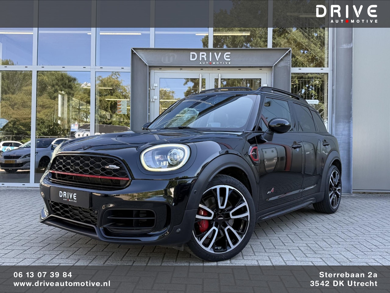 MINI Countryman - Mini 2.0 John Cooper Works ALL4 Chili |Pano|H&K|Cam - AutoWereld.nl