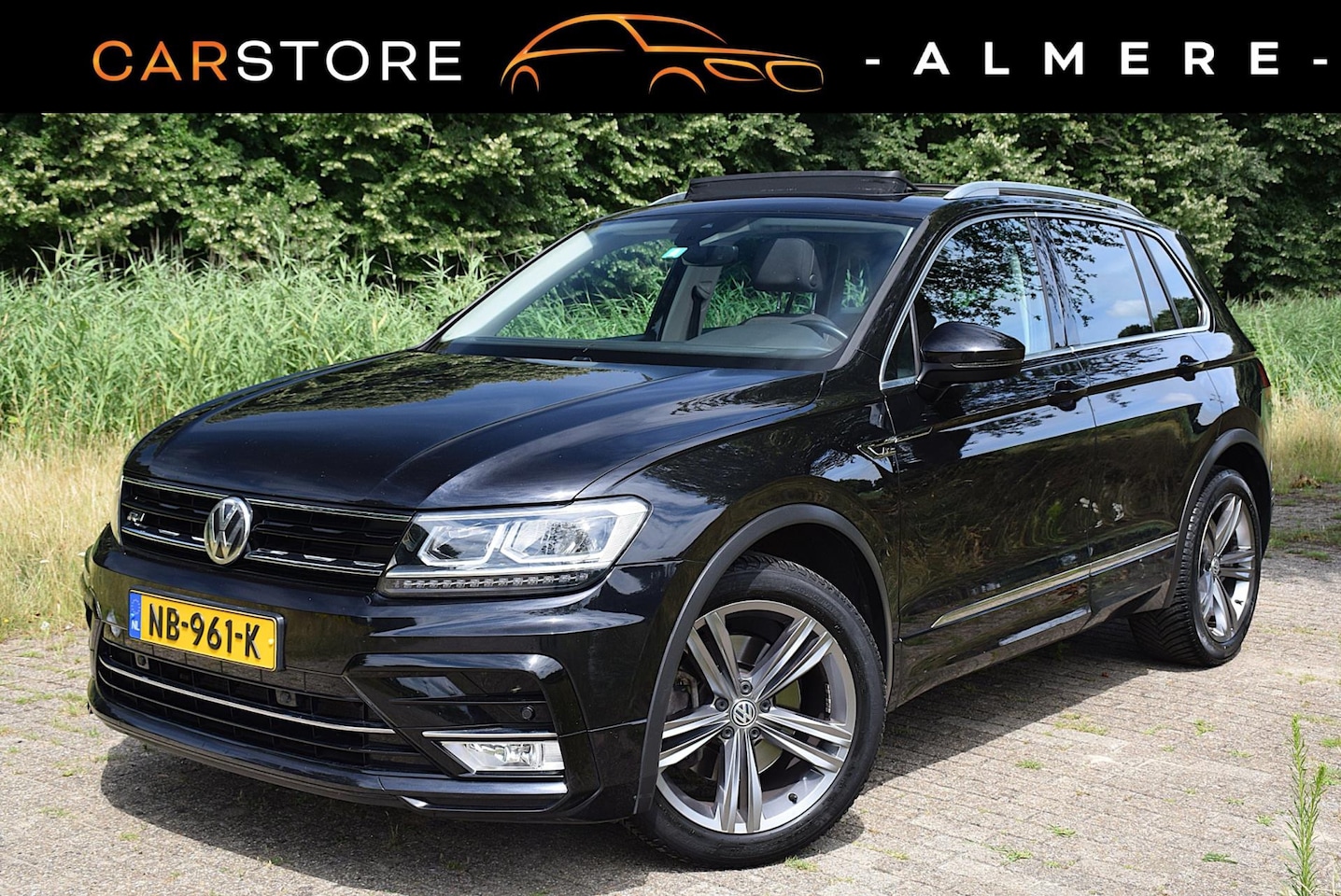 Volkswagen Tiguan - 2.0 TSI 4Motion R-Line*Pano*Adaptive Cruise*180PK*1e eig*Enz* - AutoWereld.nl