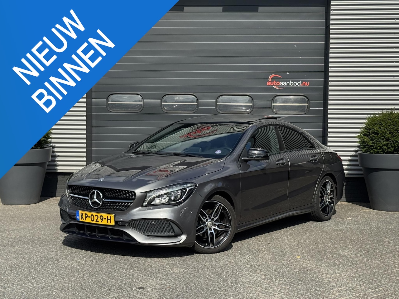 Mercedes-Benz CLA-Klasse - 180 AMG Night Edition Plus | Panoramadak | Carbon | Navigatie | Climate Control | - AutoWereld.nl