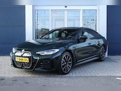 BMW i4 - eDrive40 High Executive 84 kWh M-Sport Sanremo Grün | HUD | Camera | Carplay | Trekhaak |