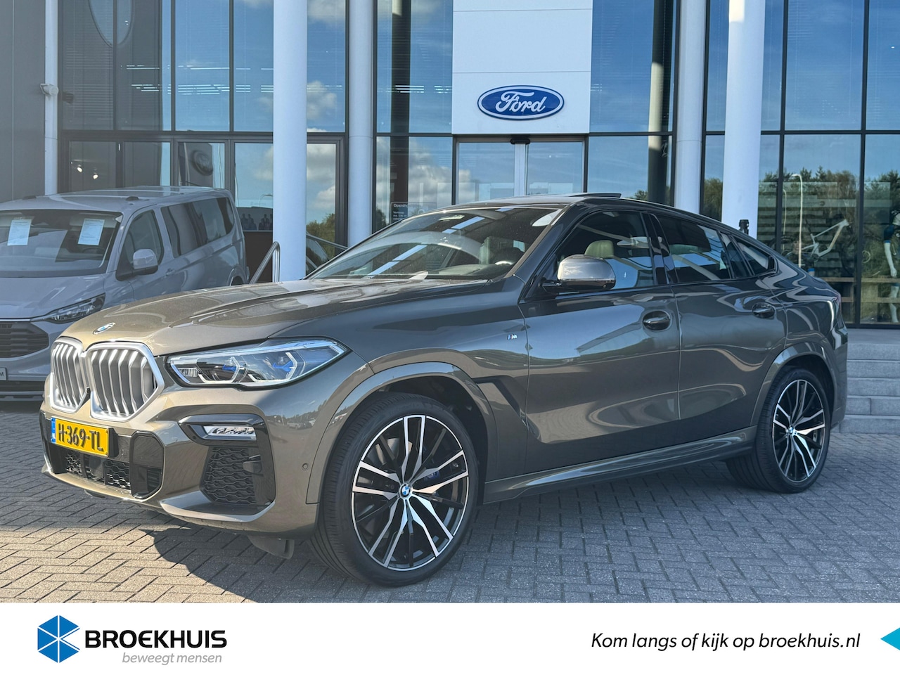 BMW X6 - xDrive40i High Executive | HUD | H&K | Pano | Luchtvering | 360 Camera | Stuurverwarming | - AutoWereld.nl