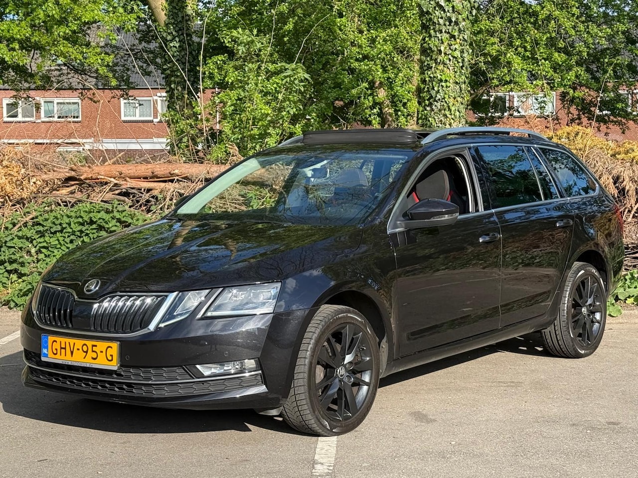 Skoda Octavia Combi - 1.6 TDI Style Pano Sport Stoelen DSG - AutoWereld.nl