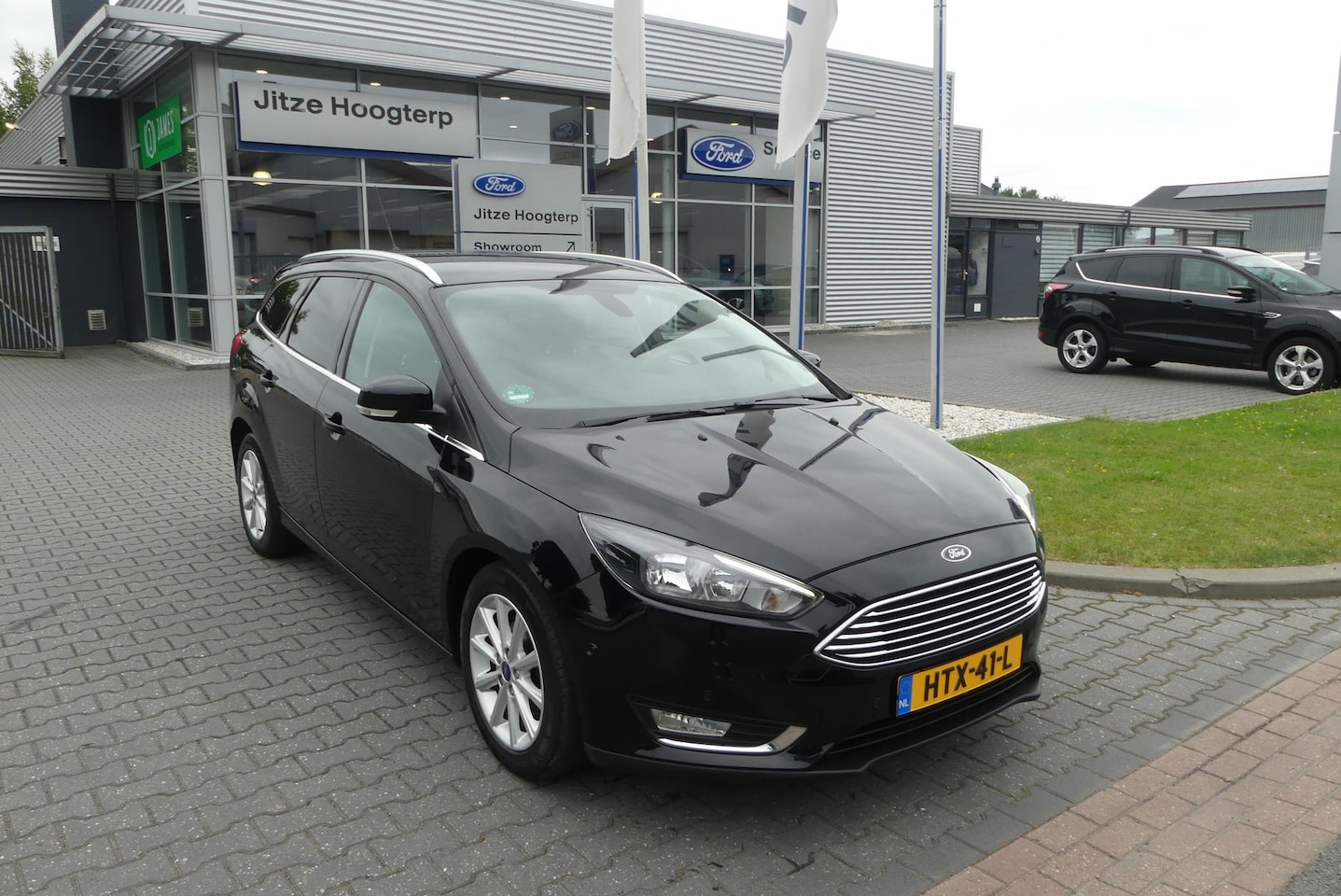 Ford Focus Wagon - 1.0 Titanium Edition D.RIEM NIEUW, CRUISE, CLIMA, WINTER PACK, PDC V&A, NAVI, 112.965KM - AutoWereld.nl