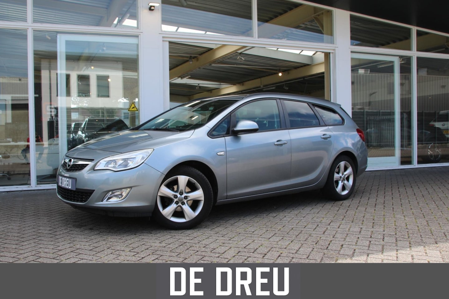 Opel Astra Sports Tourer - 1.4 Turbo Edition | TREKHAAK | CRUISE | AIRCO - AutoWereld.nl