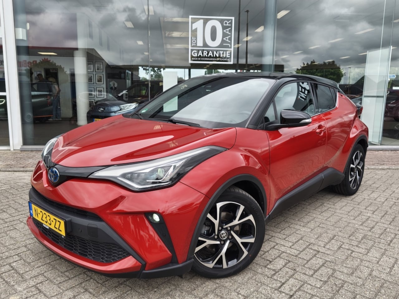 Toyota C-HR - 1.8 Hybrid Style Luxury | JBL | Vol Leder | Navi | Blind Spot | - AutoWereld.nl