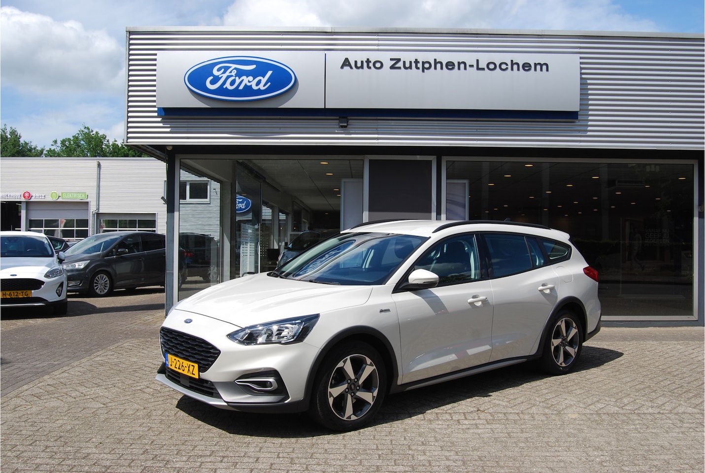 Ford Focus Wagon - 1.0 EcoBoost 125PK Hybrid Active Business TREKHAAK | WINTERPACK | AUT.AIRCO | CAMERA | APP - AutoWereld.nl