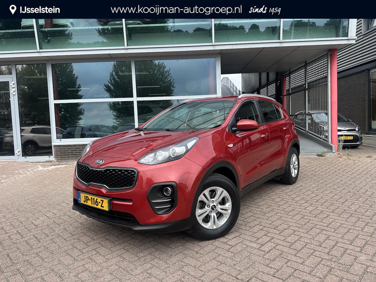Kia Sportage - 1.6 GDI ComfortLine Navigator Trekhaak, Navi, Camera - AutoWereld.nl