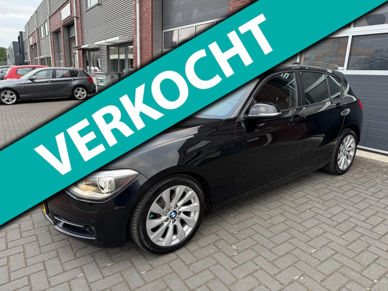 BMW 1-serie - 118i Sportline AUT LED Navi H/Kardon Stoelvw PDC - AutoWereld.nl