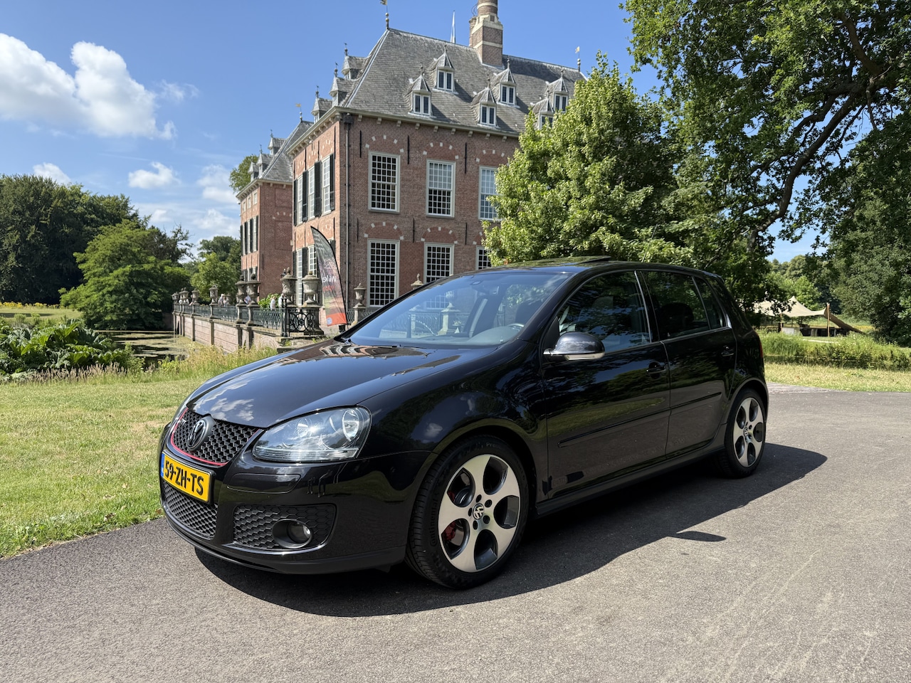 Volkswagen Golf - 2.0 TFSI GTI / DSG / RNS510 / Schuifdak / 200 PK / 12 Maanden Garantie! - AutoWereld.nl