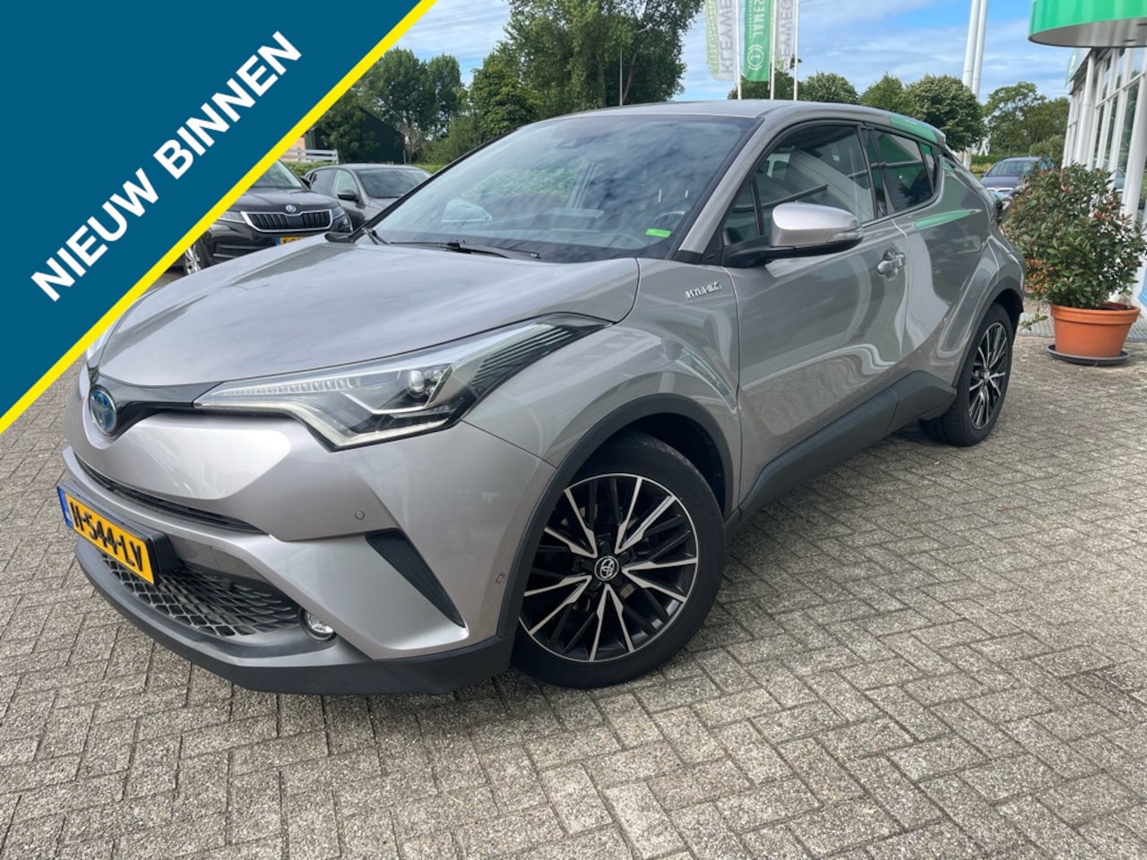 Toyota C-HR - 1.8 Hybrid Executive 1.8 Hybrid Executive, Nav, Camera, Leder, Stoelverw - AutoWereld.nl