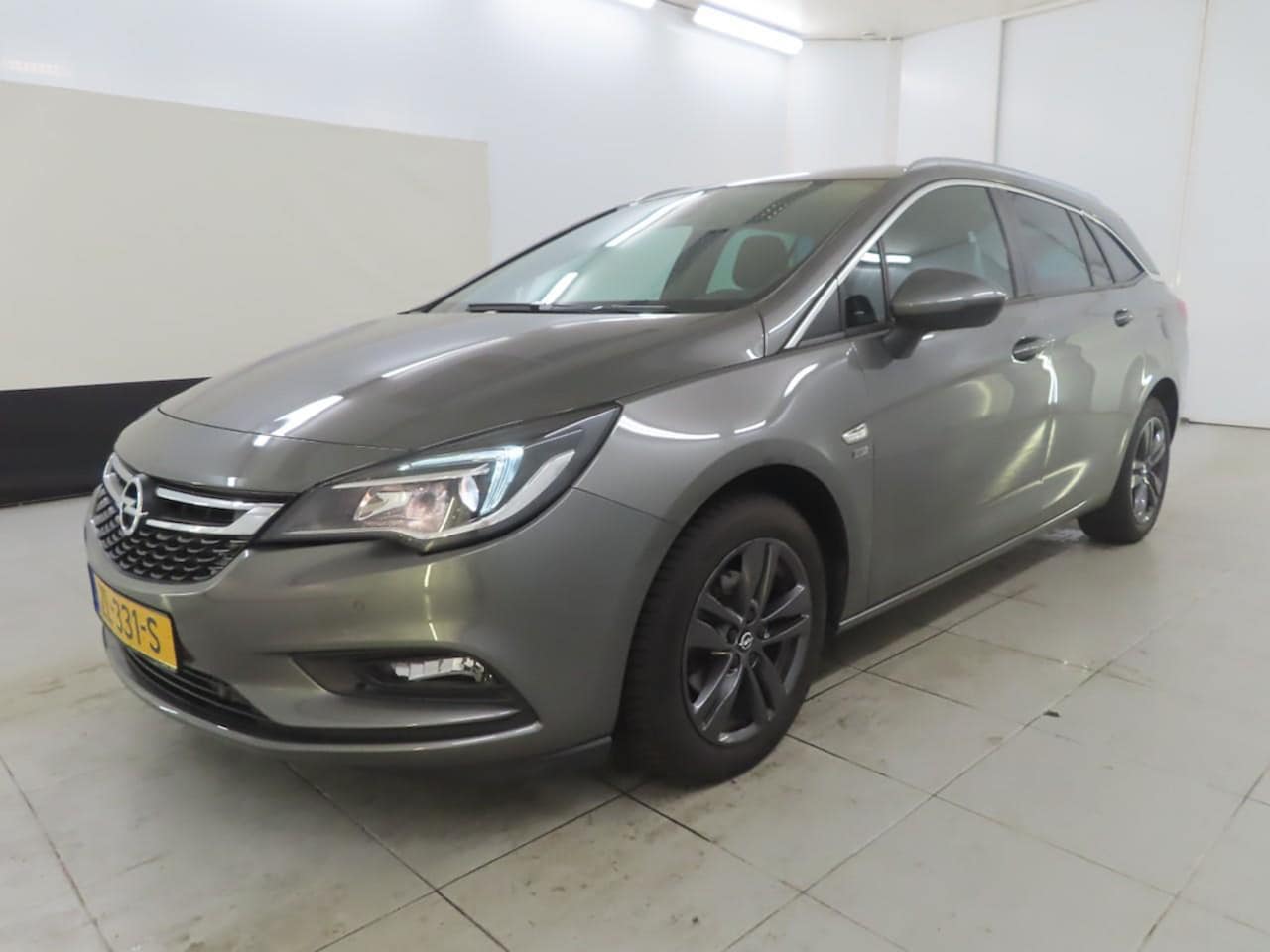 Opel Astra Sports Tourer - 1.0 TURBO NAVIGATIE L.M. VELGEN BLUETOOTH - AutoWereld.nl
