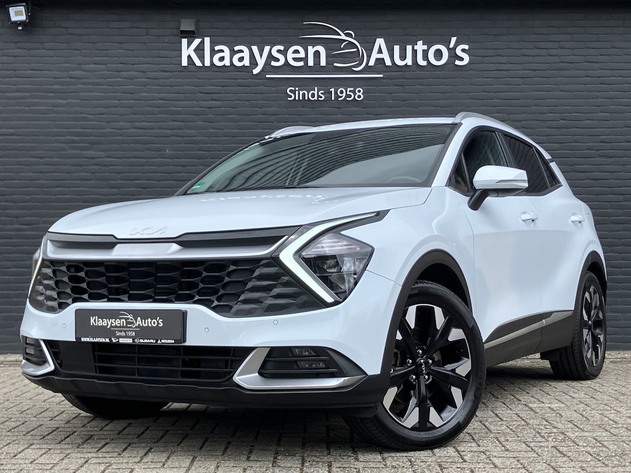 Kia Sportage - 1.6 T-GDi PHEV AWD 265 pk DynamicPlusLine AUT. | 1e eigenaar | navi | adaptieve cruise | e - AutoWereld.nl
