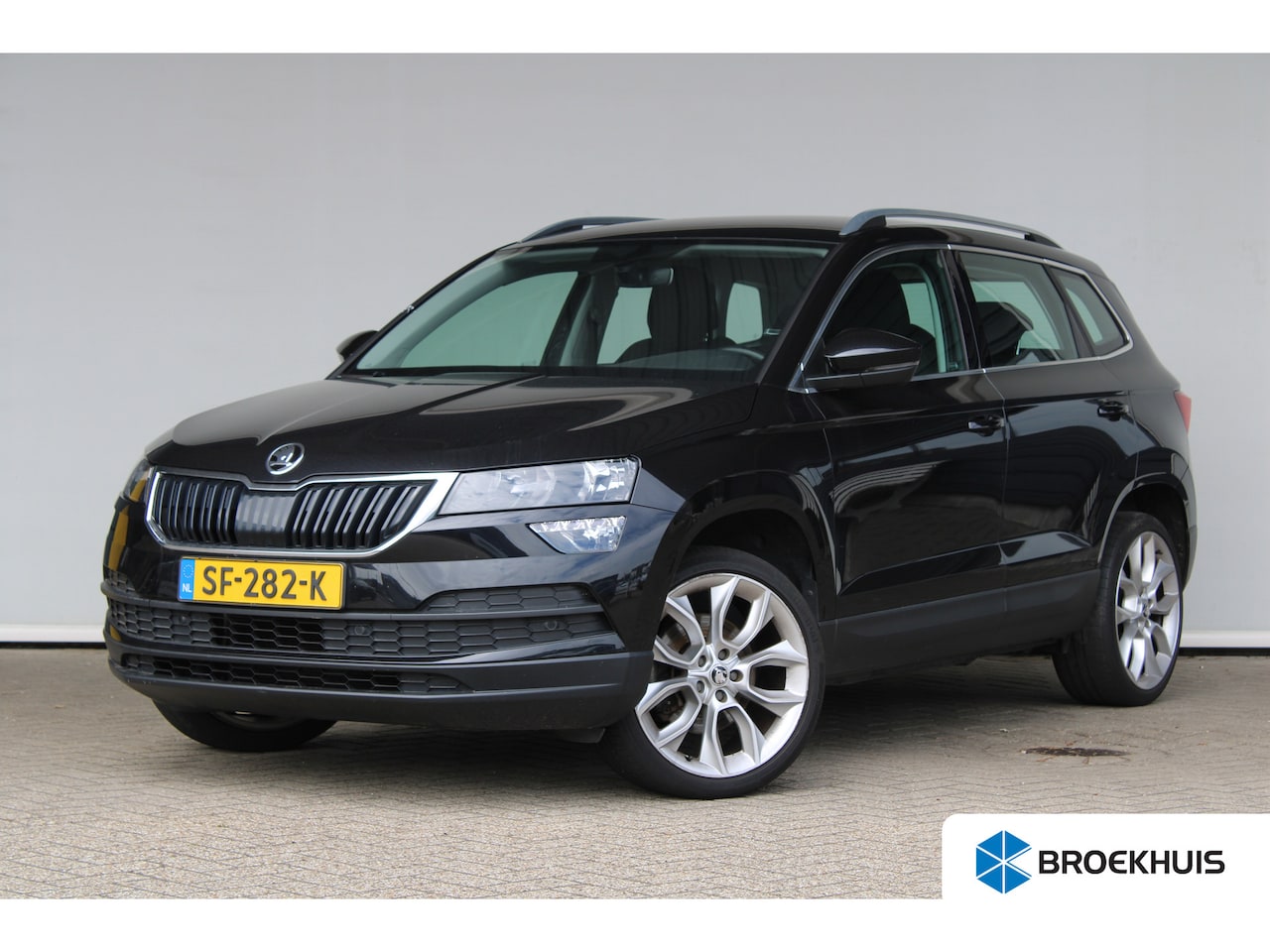 Skoda Karoq - 1.0 TSI Ambition Business | Apple Carplay/Android Auto|telefoonintegratie premium | Dimlic - AutoWereld.nl