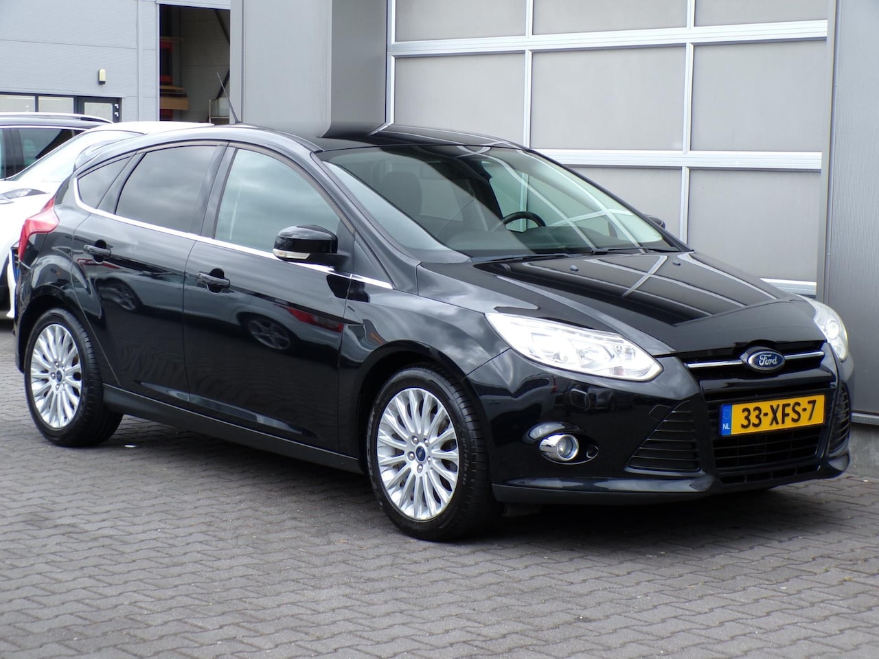 Ford Focus - 1.0 EcoBoost Titanium|Xenon|Navi|Cruise|PDC|Clima - AutoWereld.nl