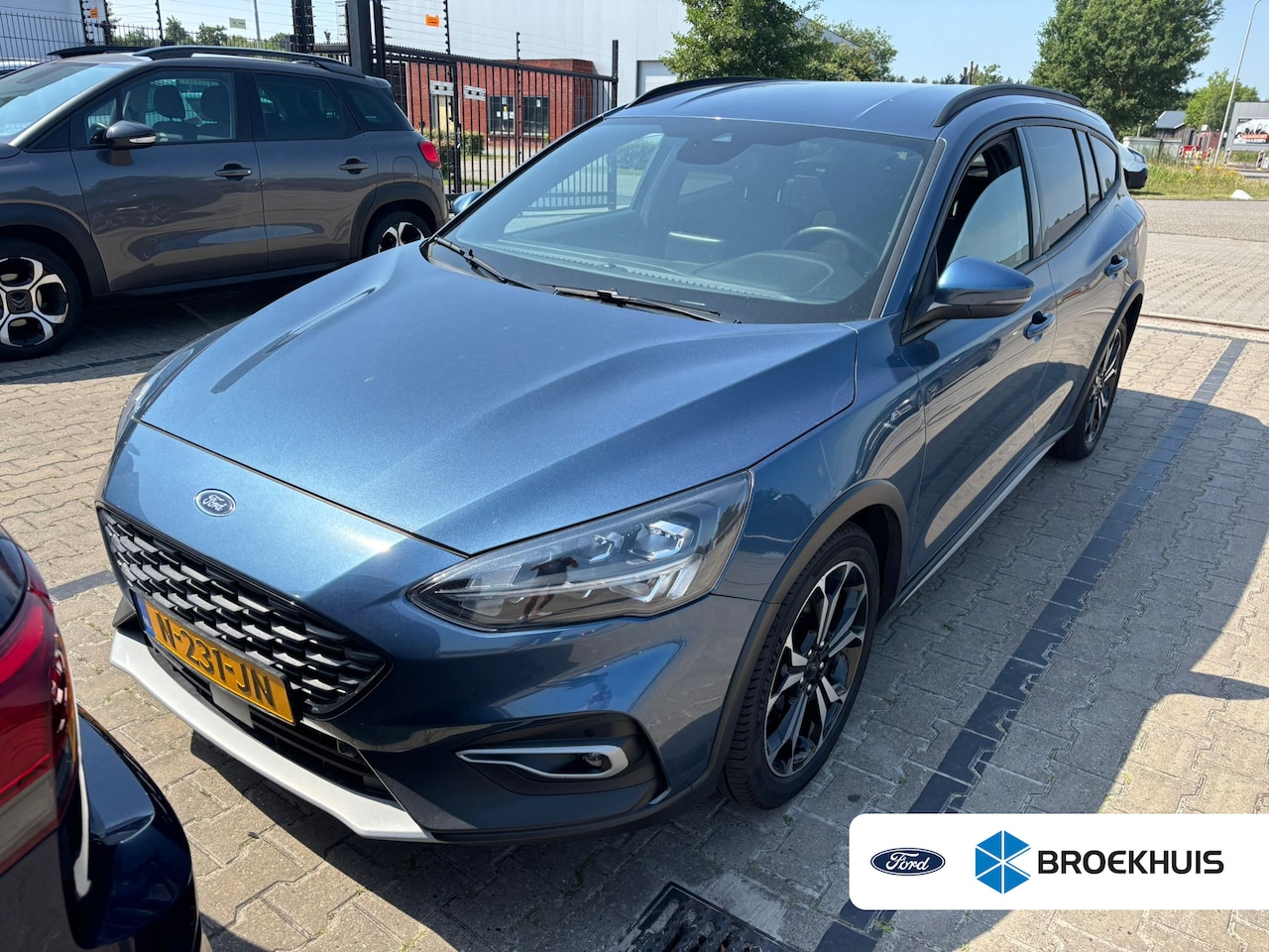 Ford Focus Wagon - 1.0 EcoBoost Hybrid Active X Business | Trekhaak | Cruise adaptief | Winterpakket | Camera - AutoWereld.nl