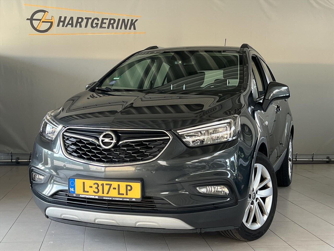 Opel Mokka X - 1.4i T 140pk Online Edition *ECC/Navi* - AutoWereld.nl