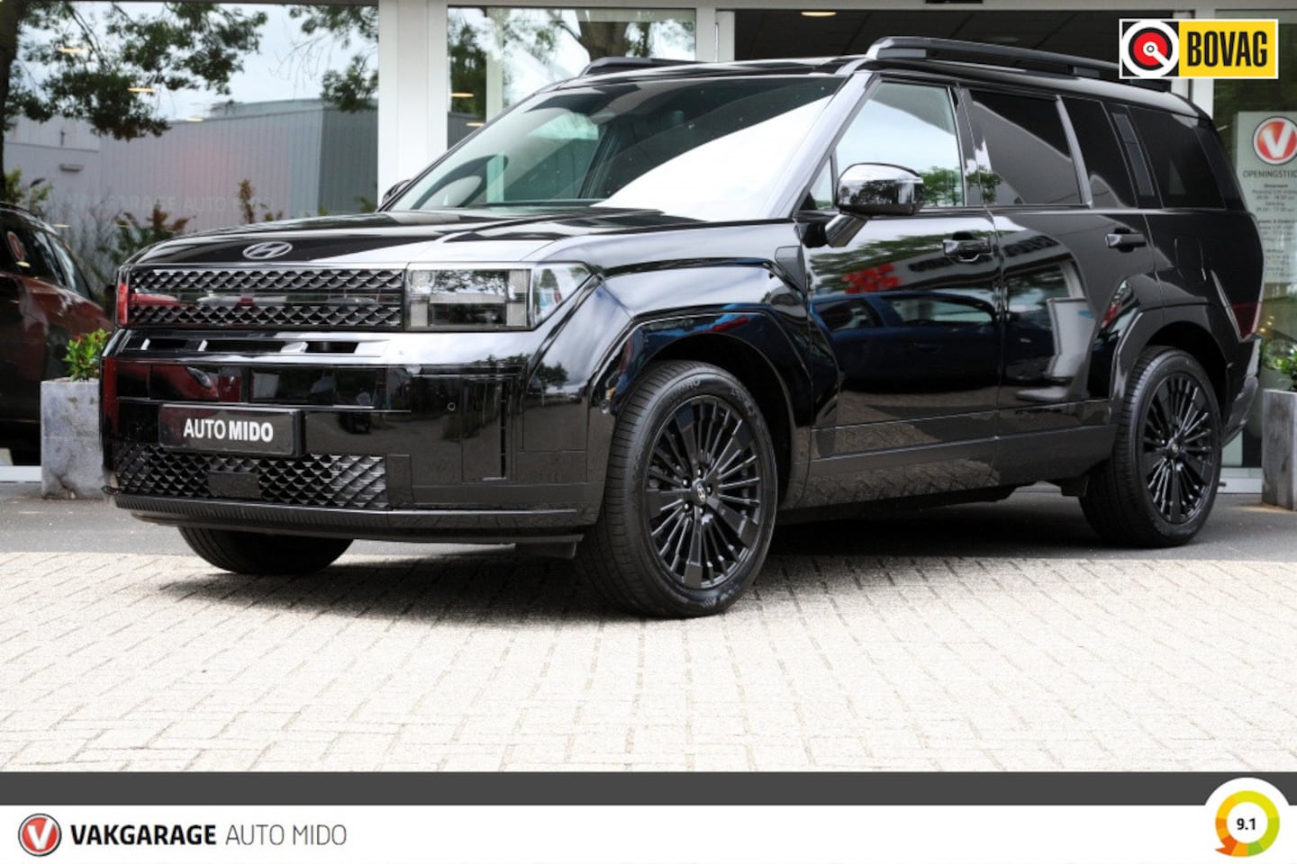 Hyundai Santa Fe - 1.6 T-GDI Blackline Hybrid 4WD | 2x panorama | Black Nappa leder - AutoWereld.nl