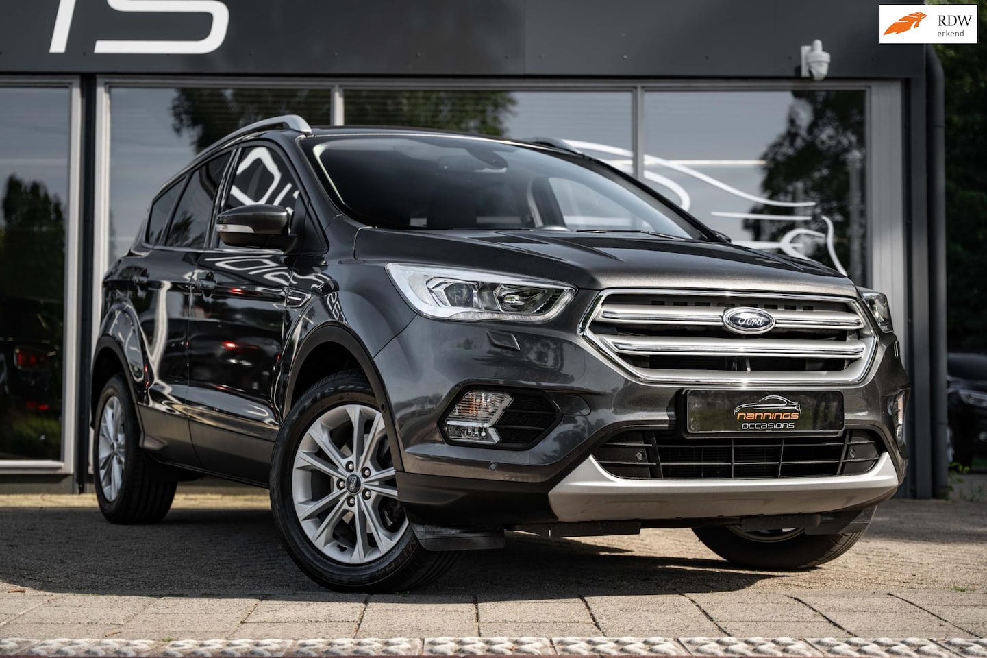 Ford Kuga - 1.5 EcoBoost Titanium|Trekhaak|Sony sound|Half leder|Cruise|Climate|Elec achterklep|PDC - AutoWereld.nl