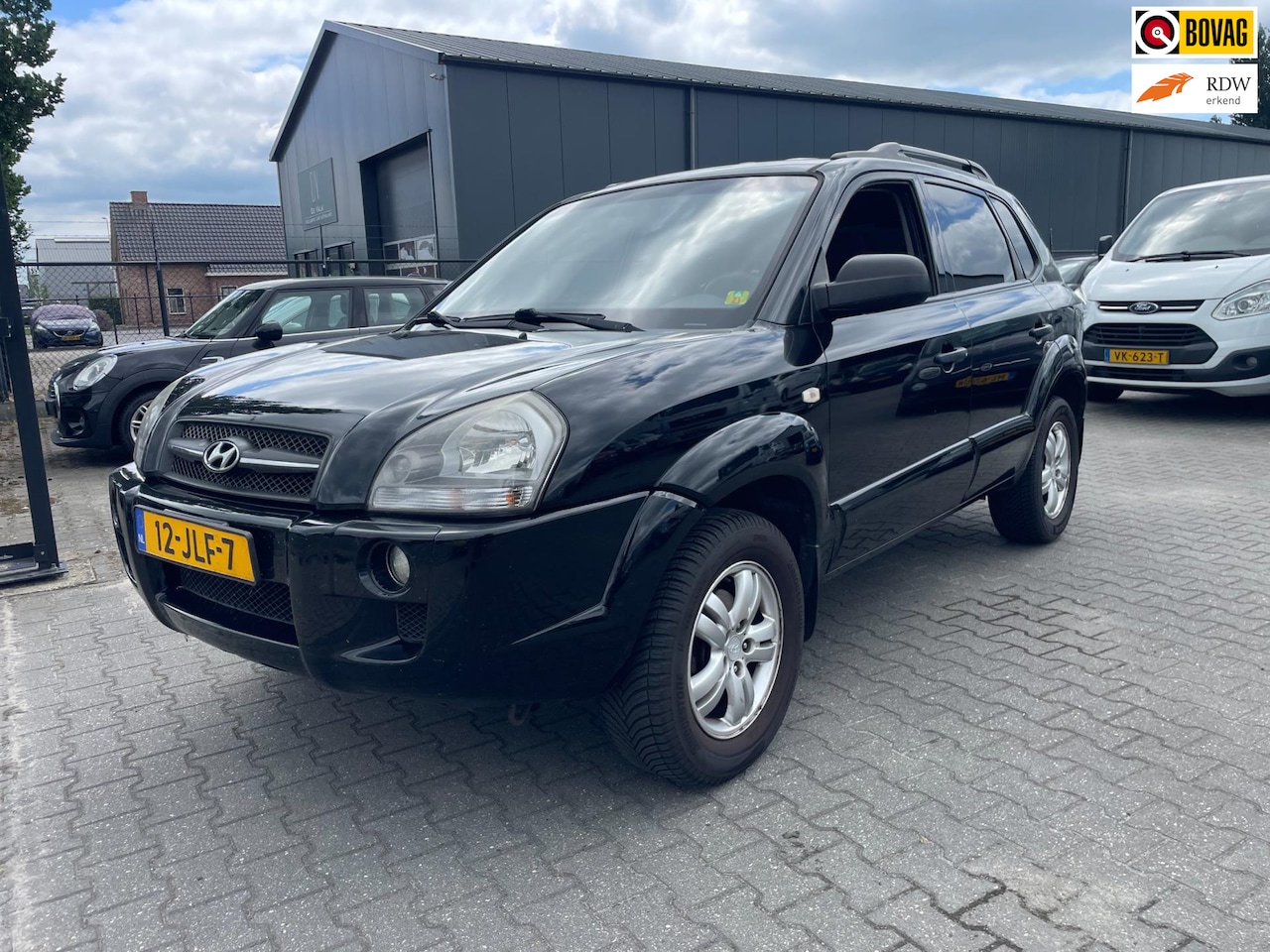 Hyundai Tucson - 2.0i Dynamic Executive 2.0i Dynamic Executive - AutoWereld.nl