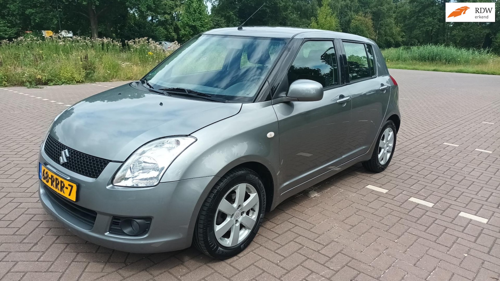 Suzuki Swift - 1.3 Automaat / Airco / Leder - AutoWereld.nl