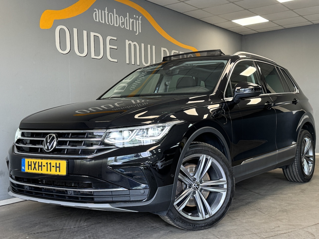 Volkswagen Tiguan - 1.4 TSI eHybrid Business+ Stoelverwarming/Panoramadak/ACC - AutoWereld.nl