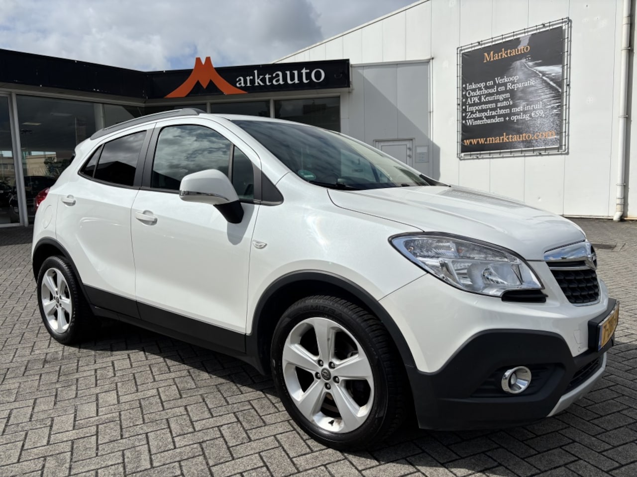 Opel Mokka - 1.6 Cosmo Navi Cruise Trekhaak Parkeersensoren V+A - AutoWereld.nl