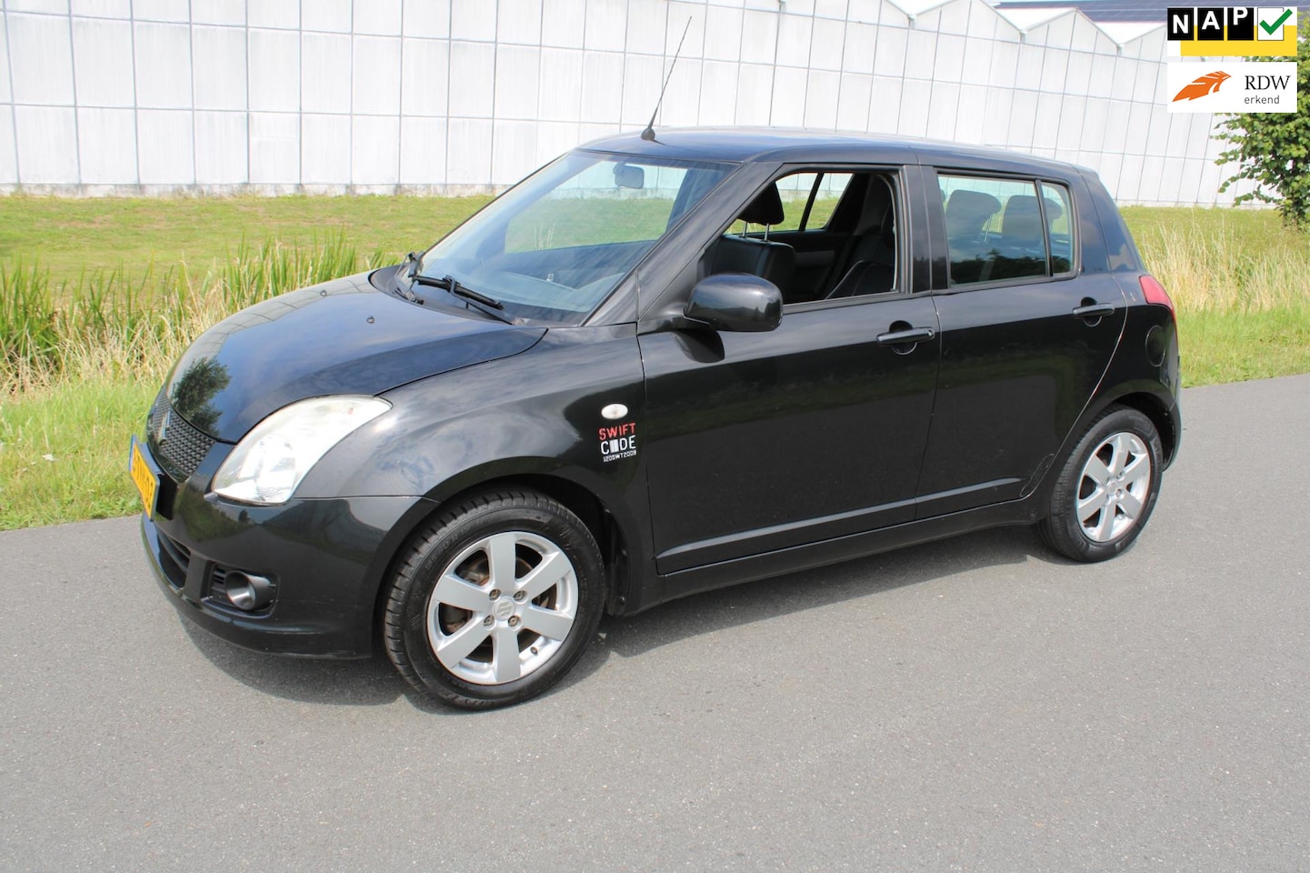 Suzuki Swift - 1.3 Comfort 5 Drs met Leder en Airco - AutoWereld.nl
