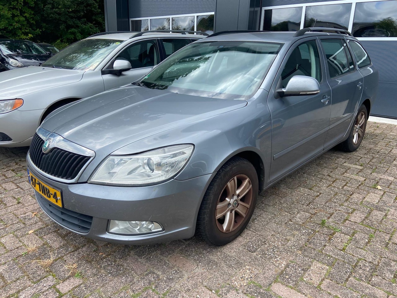 Skoda Octavia Combi - 1.2 TSI Ambition Business Line 1.2 TSI Ambition Business Line, BJ`2012 - AutoWereld.nl