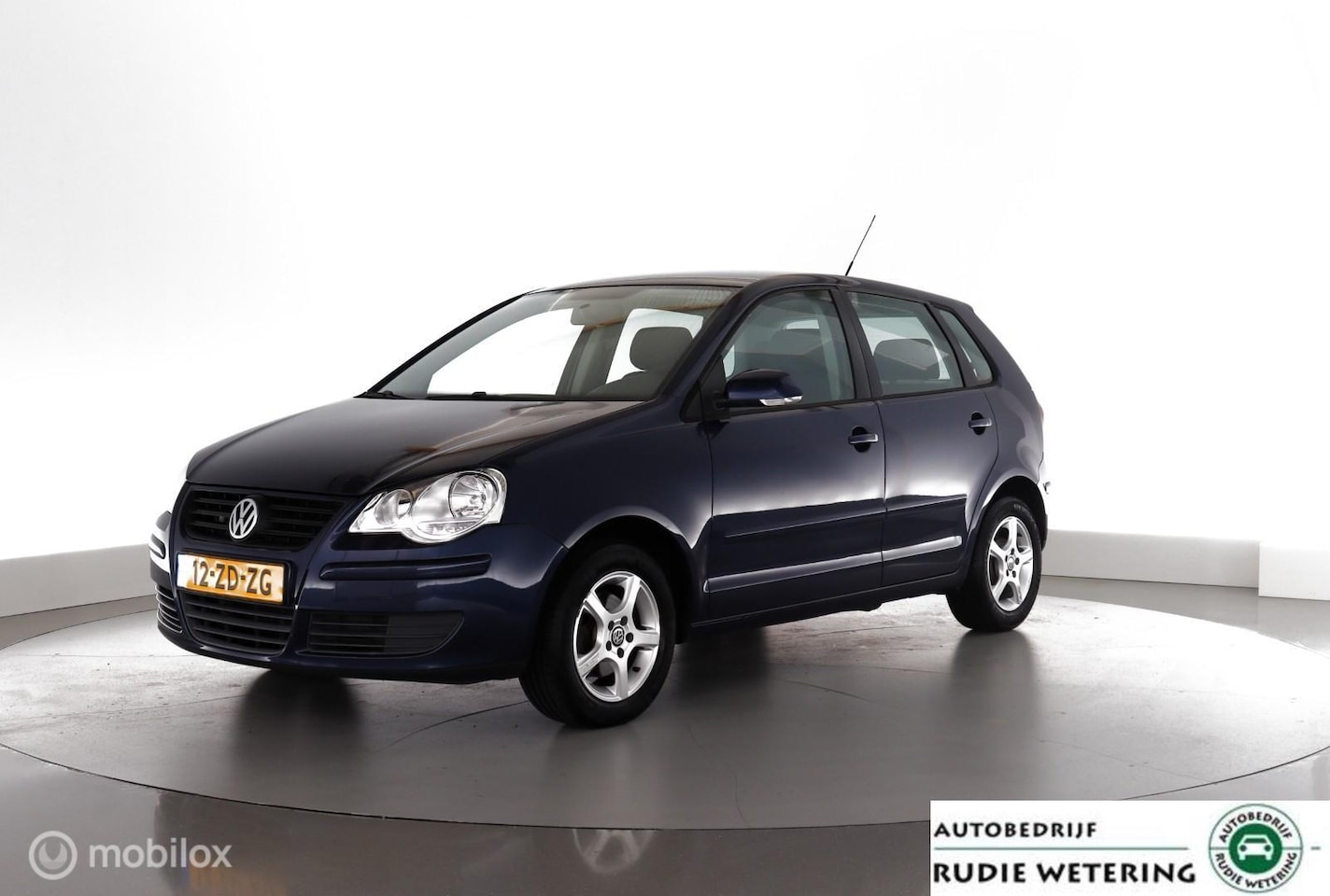 Volkswagen Polo - 1.4-16V 80PK Optive 5drs|airco|lmv - AutoWereld.nl