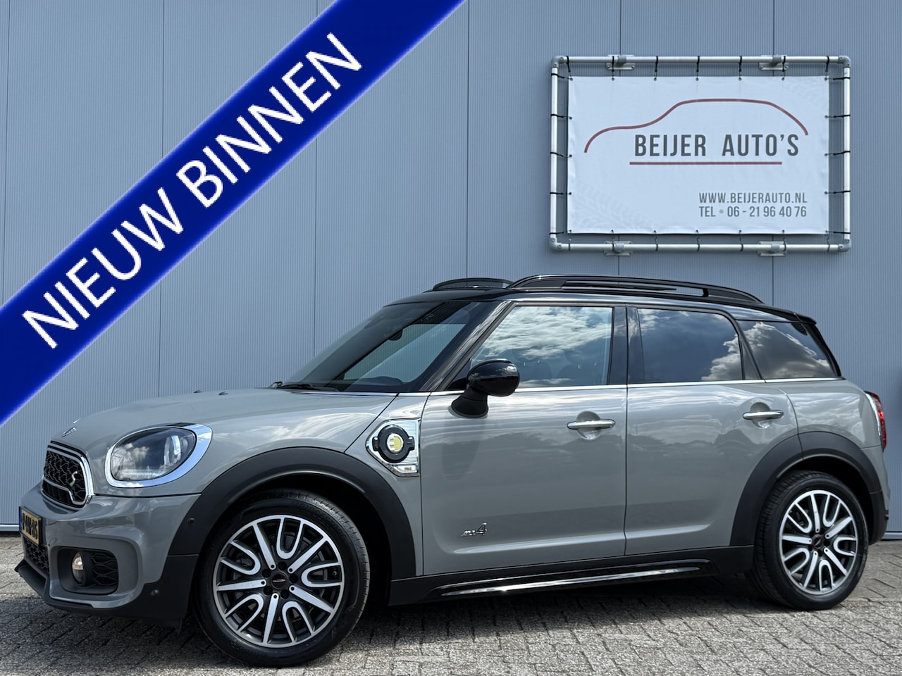 MINI Countryman - Mini 2.0 Cooper S E ALL4 Chili Schuifdak. - AutoWereld.nl