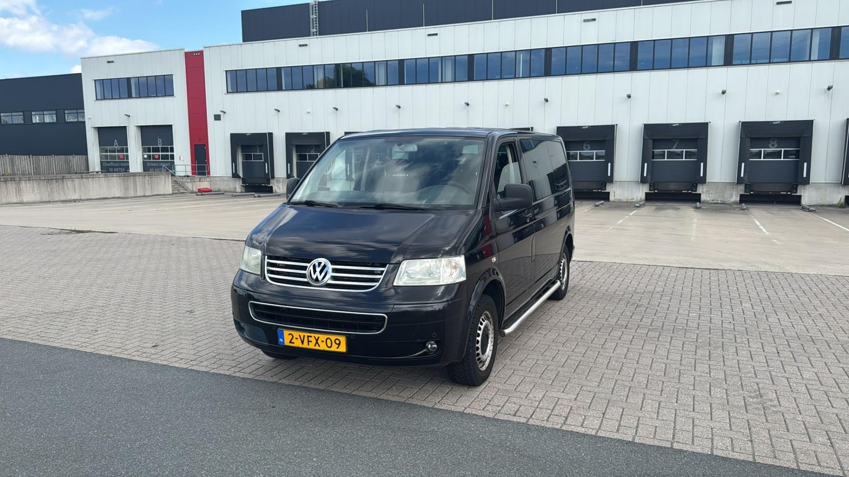 Volkswagen Transporter - 2.5 TDI 300 4M Budgetline DC Dubbele Cabine Airco Zwart 2009 - AutoWereld.nl