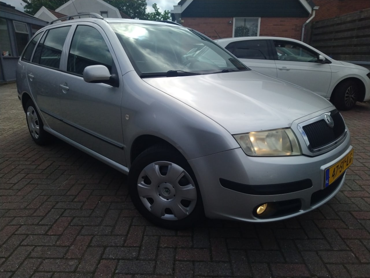 Skoda Fabia Combi - 1.4-16V Spirit+ - AutoWereld.nl