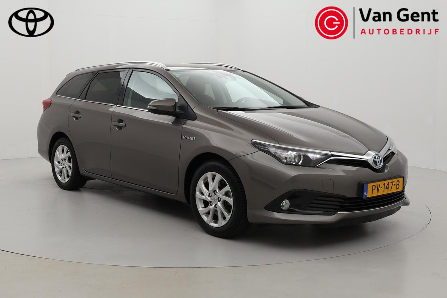 Toyota Auris Touring Sports - 1.8 Hybrid Dynamic Go | Navigatie | Clima | Cruise Control | Keyless | Camera | 16 inch | - AutoWereld.nl