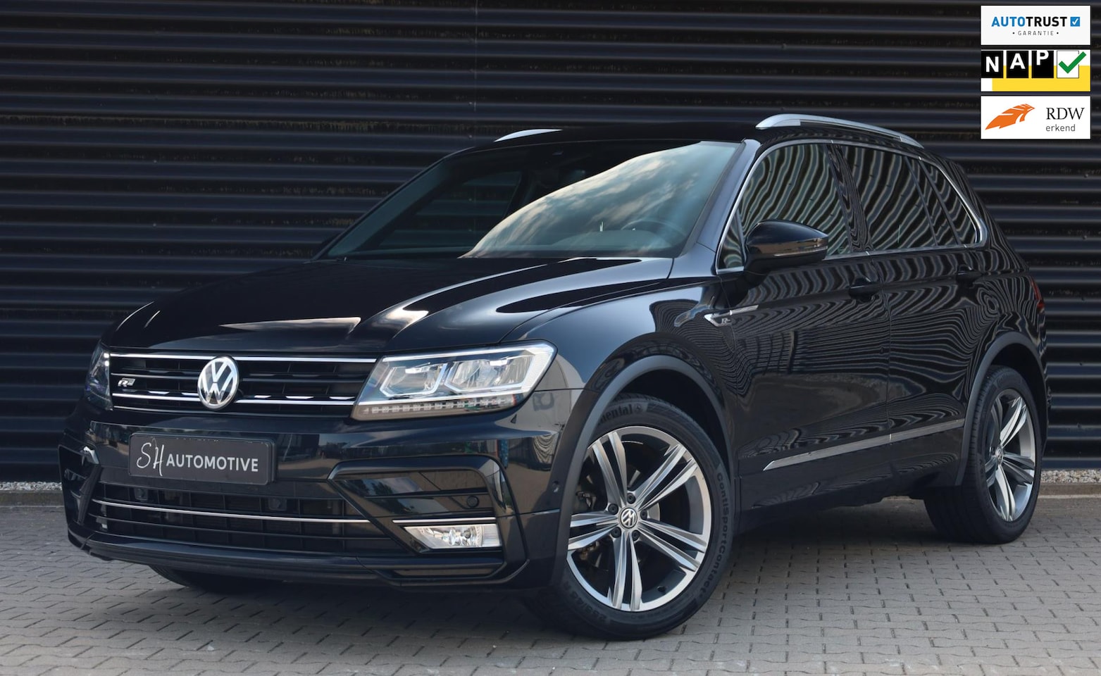 Volkswagen Tiguan - 1.4 TSI R-Line / FULL / STOELVERWARMING / TREKHAAK / CAMERA - AutoWereld.nl